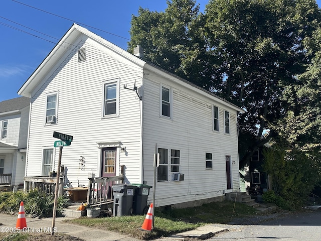 view of front of home with cooling unit