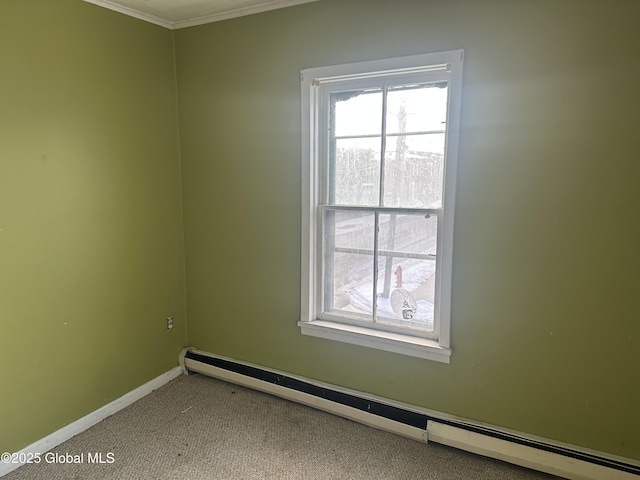 carpeted empty room featuring a baseboard heating unit