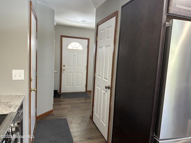 doorway to outside with light hardwood / wood-style floors