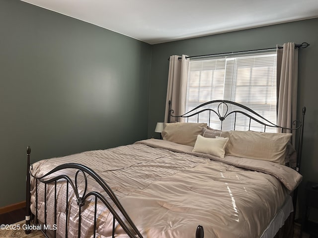 bedroom featuring hardwood / wood-style floors