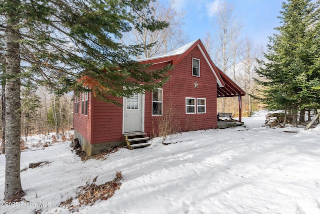 view of snow covered property