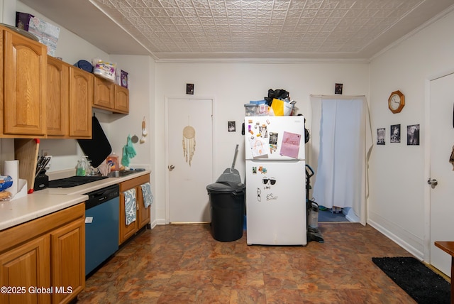 kitchen featuring white refrigerator and dishwasher