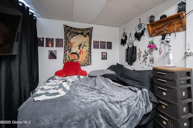 bedroom with a drop ceiling