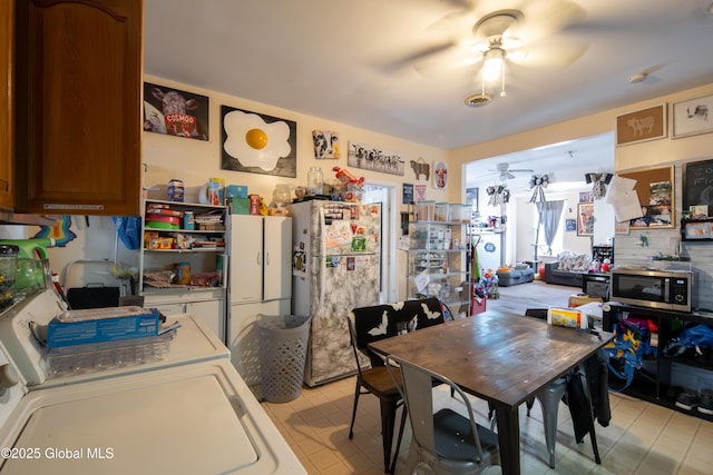 kitchen featuring fridge and ceiling fan