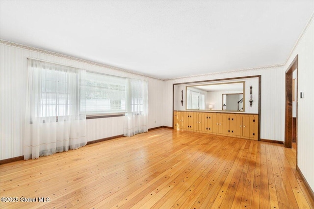 unfurnished living room featuring light hardwood / wood-style floors