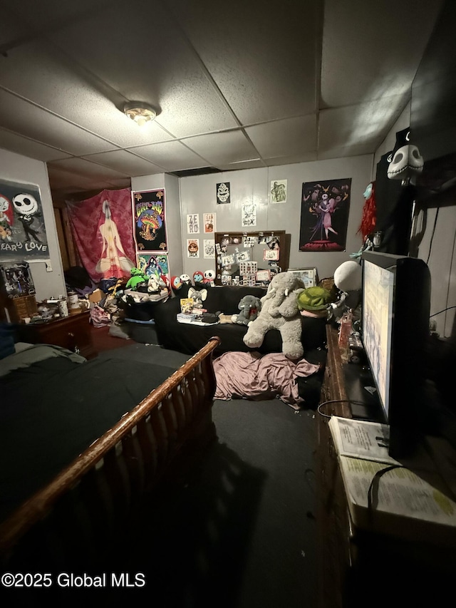 bedroom with a paneled ceiling