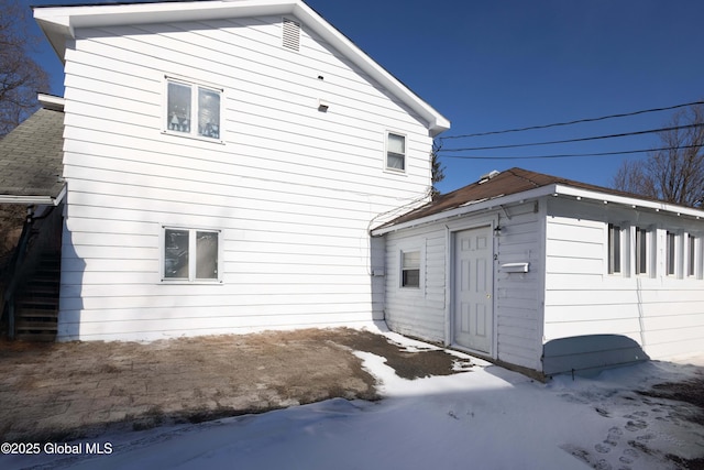 view of snow covered property