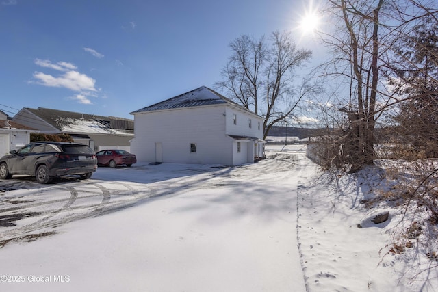 view of snow covered property