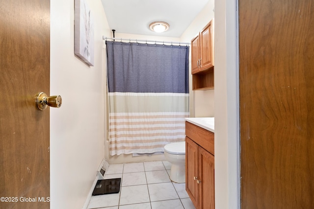 full bathroom with vanity, tile patterned flooring, toilet, and shower / bath combo