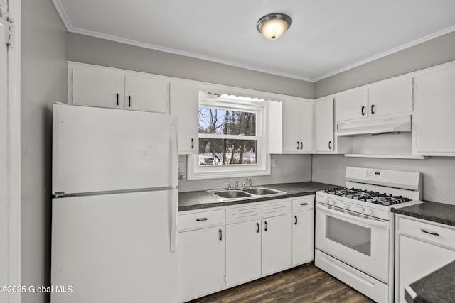 kitchen with sink, white appliances, dark wood-type flooring, ornamental molding, and white cabinets