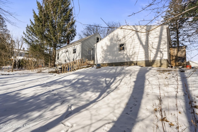 view of snow covered house