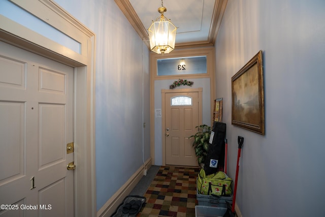 doorway with an inviting chandelier and ornamental molding