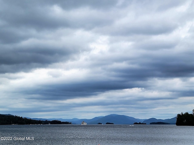 property view of water featuring a mountain view