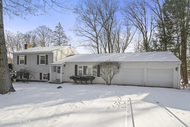 split level home with a garage