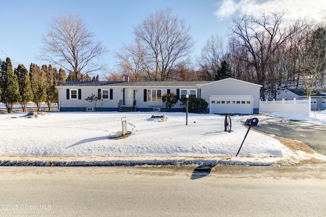 single story home with a garage