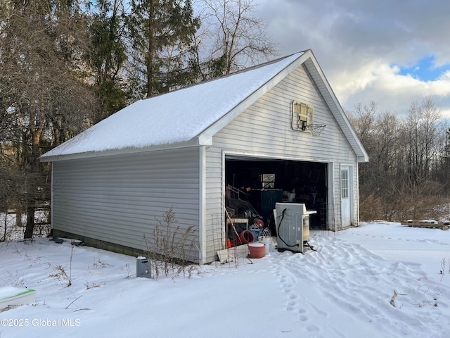 view of snow covered garage