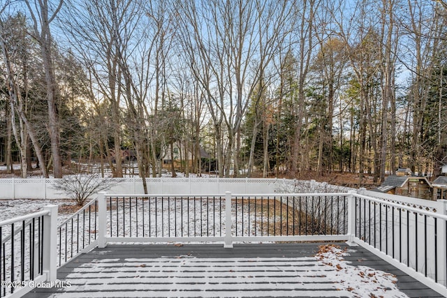 view of snow covered deck