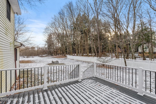 view of snow covered deck