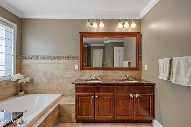 bathroom featuring ornamental molding and a healthy amount of sunlight