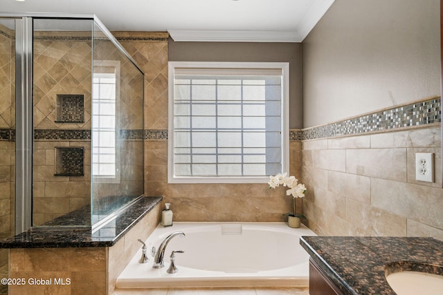 bathroom featuring vanity, crown molding, a wealth of natural light, and plus walk in shower