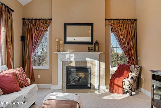 living room with light colored carpet and lofted ceiling