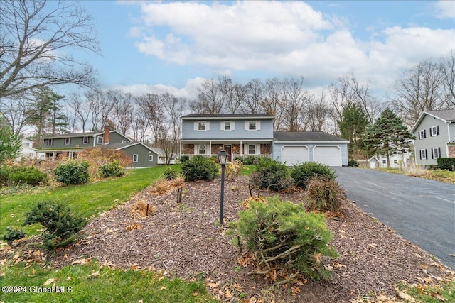 front of property featuring a garage