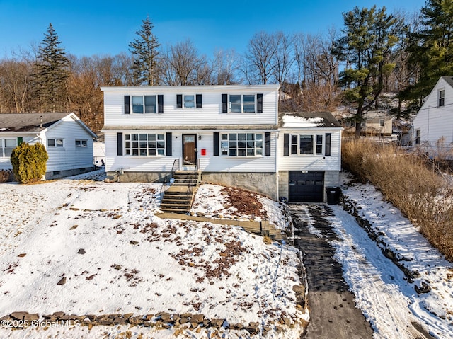 front of property featuring a garage