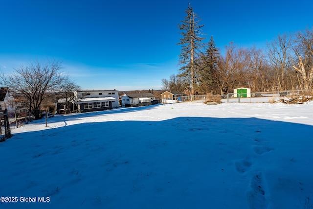 view of yard covered in snow