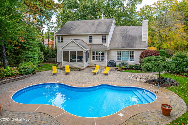 view of pool with a patio