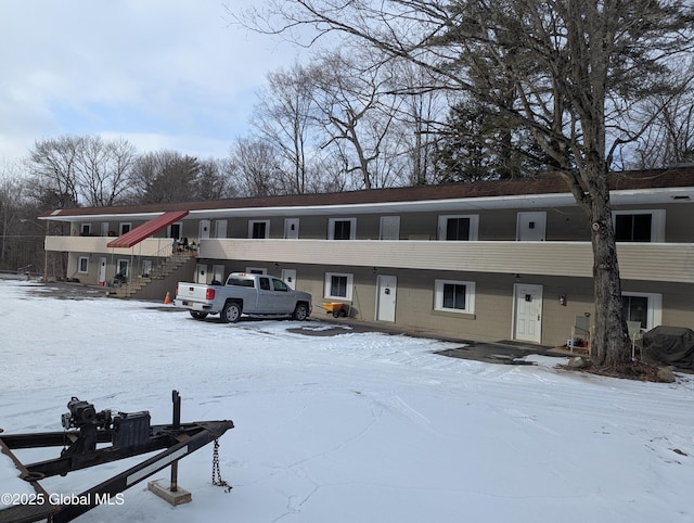 view of snow covered property