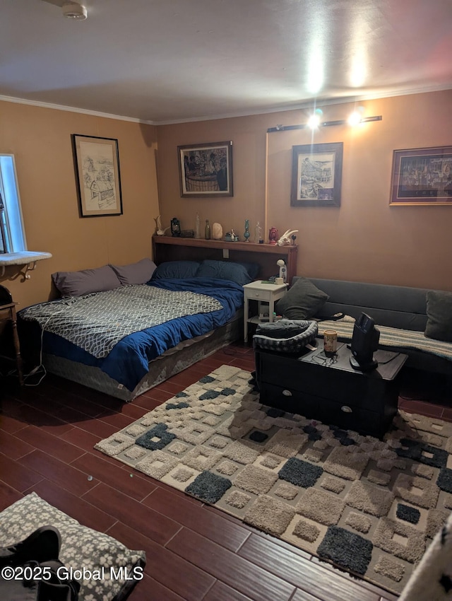 bedroom with ornamental molding