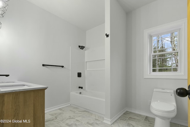 full bathroom featuring toilet, vanity, and shower / washtub combination