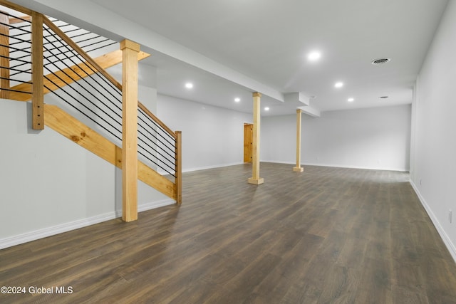 basement featuring dark wood-type flooring