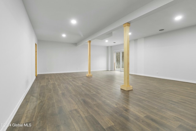 basement with dark wood-type flooring