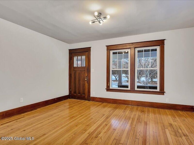 foyer entrance with light hardwood / wood-style floors