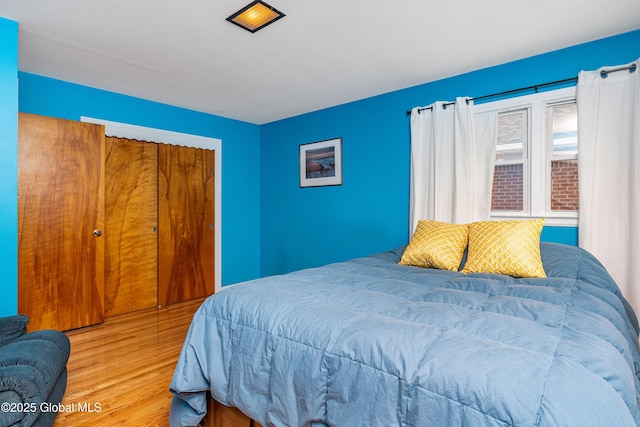 bedroom featuring light wood-type flooring