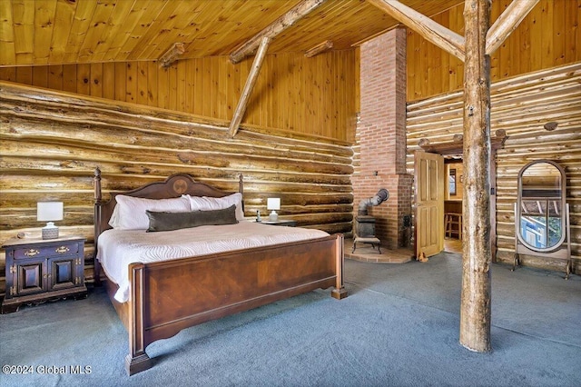 unfurnished bedroom featuring dark colored carpet, a wood stove, wood ceiling, and high vaulted ceiling