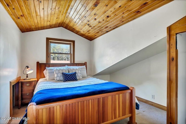 bedroom with lofted ceiling, wooden ceiling, and carpet flooring