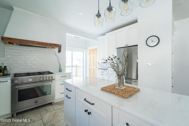 kitchen featuring stainless steel appliances, white cabinetry, hanging light fixtures, ornamental molding, and decorative backsplash