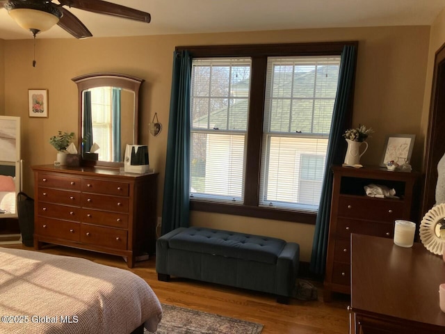 bedroom featuring ceiling fan and hardwood / wood-style floors