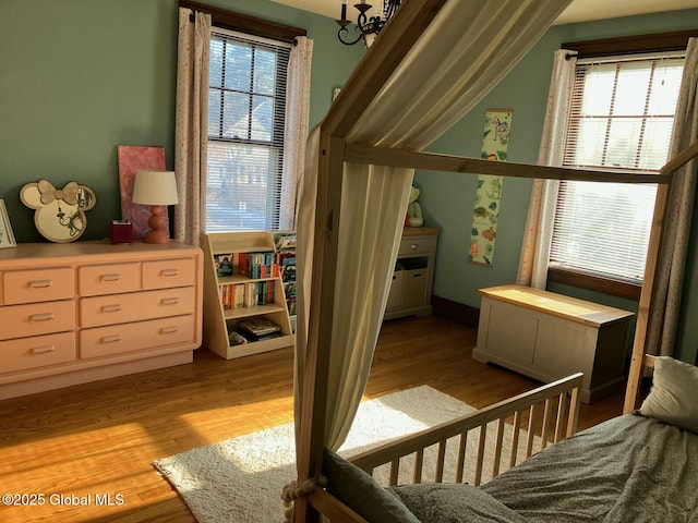 bedroom with light wood-type flooring