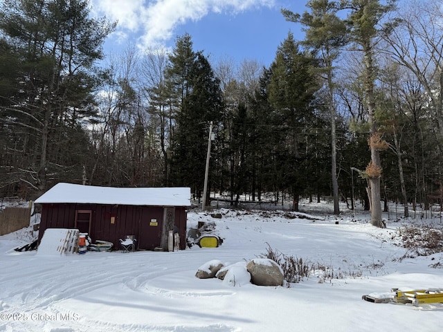 view of yard covered in snow