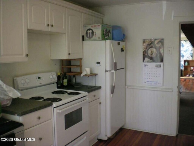 kitchen featuring white cabinetry, dark hardwood / wood-style floors, and white appliances