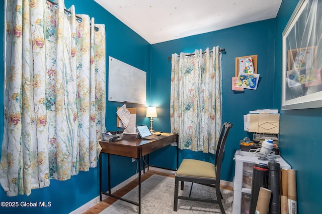 home office featuring light hardwood / wood-style floors