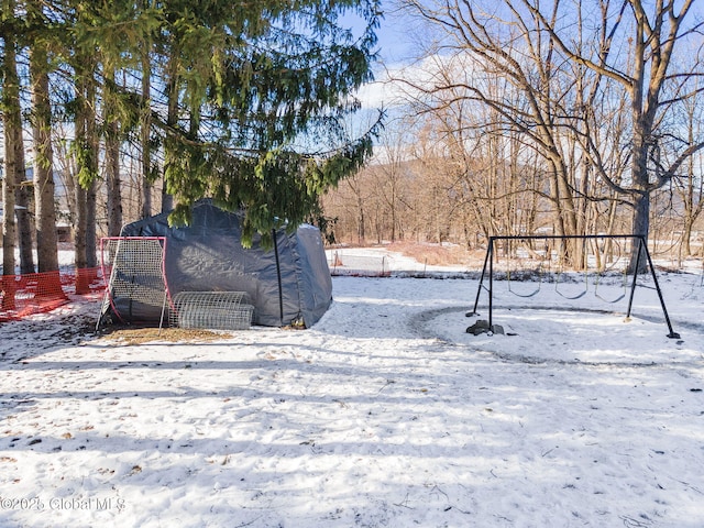 view of yard covered in snow