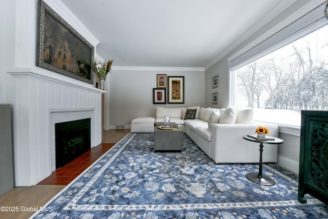 living room with dark hardwood / wood-style flooring and crown molding