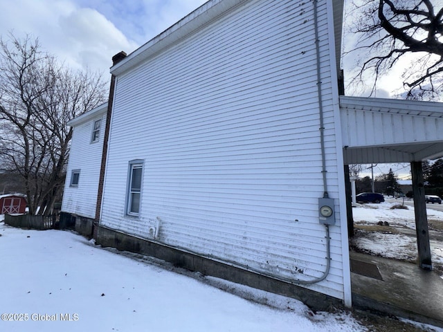 view of snow covered property