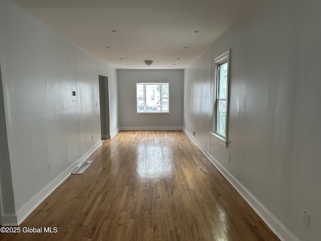 empty room featuring hardwood / wood-style floors