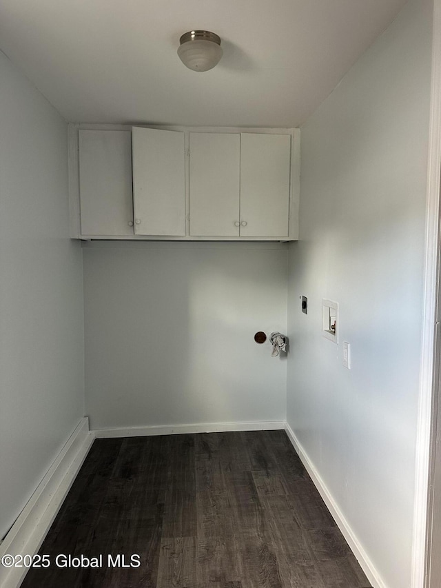 laundry room featuring cabinets, electric dryer hookup, dark hardwood / wood-style floors, and washer hookup