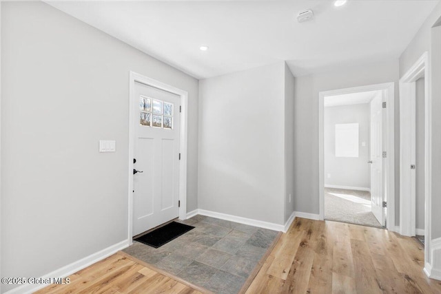 entryway featuring wood-type flooring